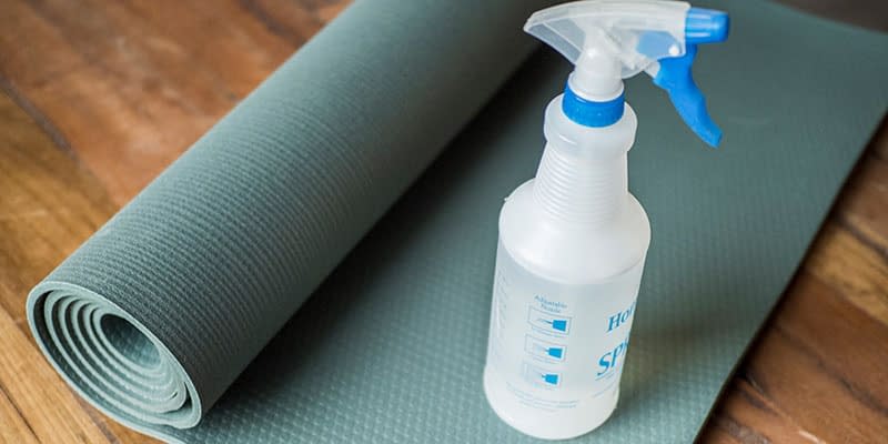yoga mat and cleaner 5 Essential Yoga Props You Should Own (Plus Extras)