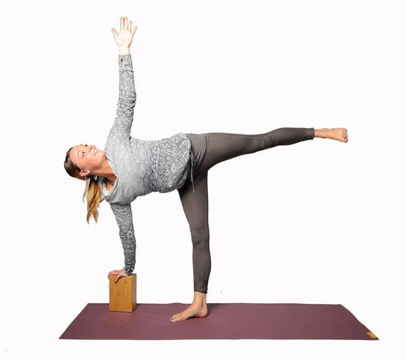 half moon pose with block 5 Essential Yoga Props You Should Own (Plus Extras)
